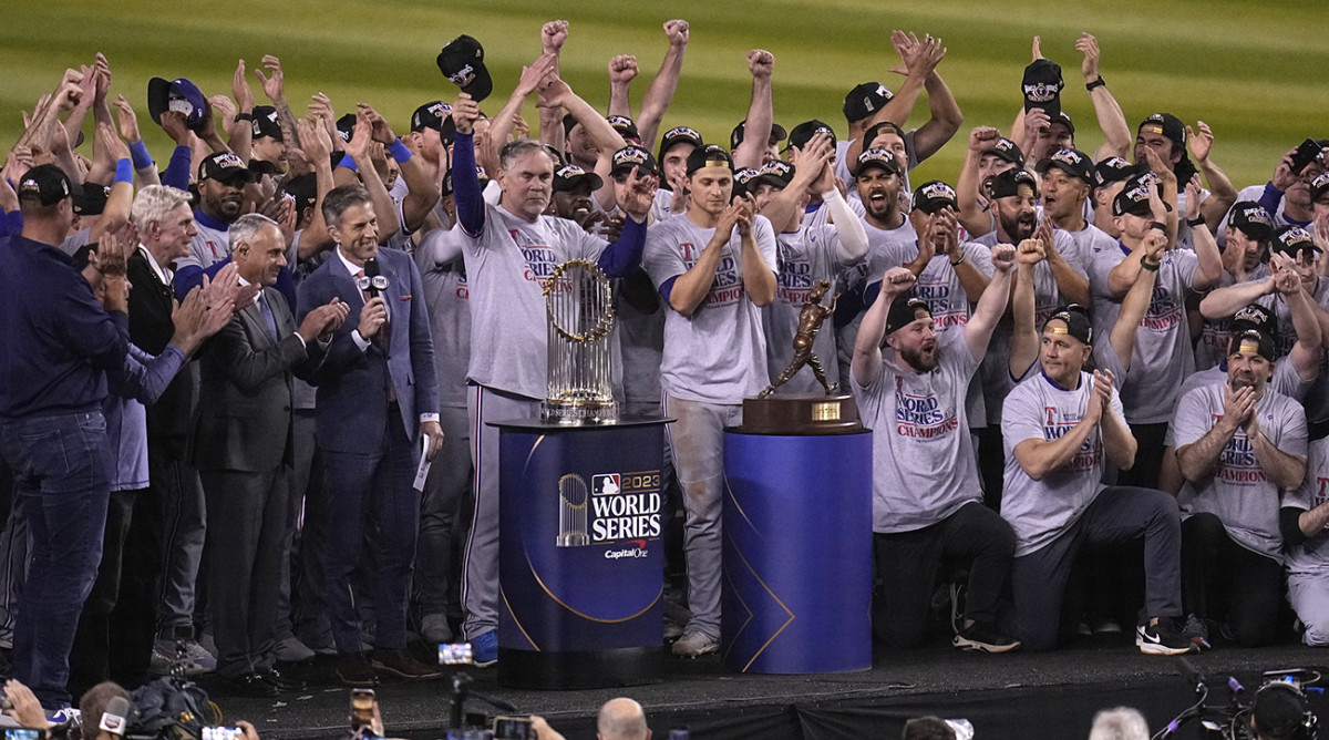 Rangers celebrate after winning Game 5 of the baseball World Series against the Diamondbacks.